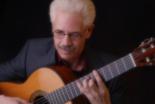 Peter Zisa playing guitar